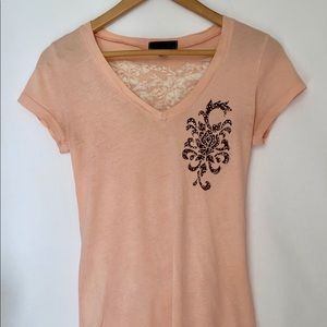 Top with a sheer patterned back
